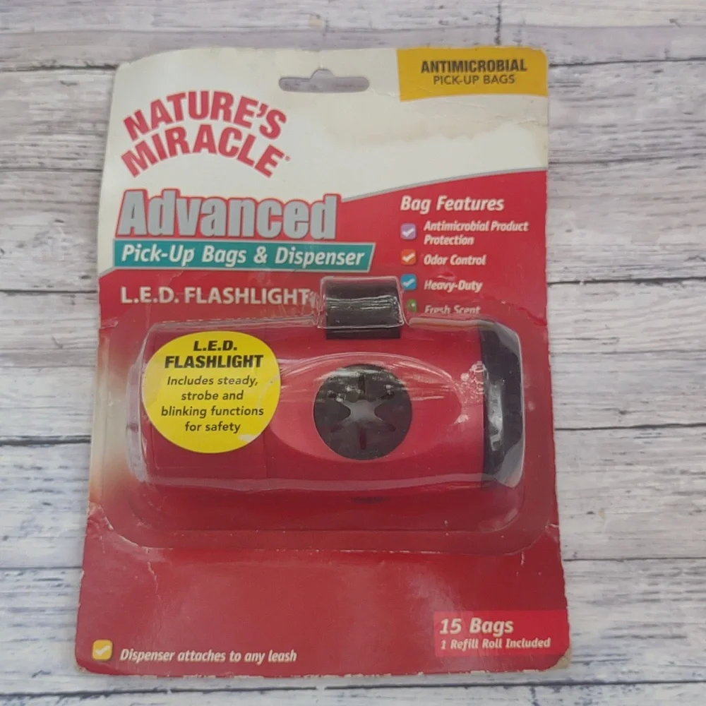Pickup dog bags with flashlight